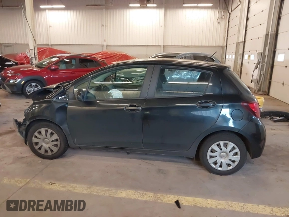 2015 Toyota Yaris L with VIN VNKKTUD32FA047472, listed as a IAAI auction lot 41674754 with 139,683 mi miles. Bid and sale history available at carsss.com. Image 15.