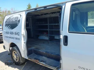 2014 Chevrolet Express Cargo Van with VIN 1GCWGFCA3E1130871, listed as a IAAI auction lot 42166083 with 279,624 mi miles. Bid and sale history available at carsss.com. Image 6.