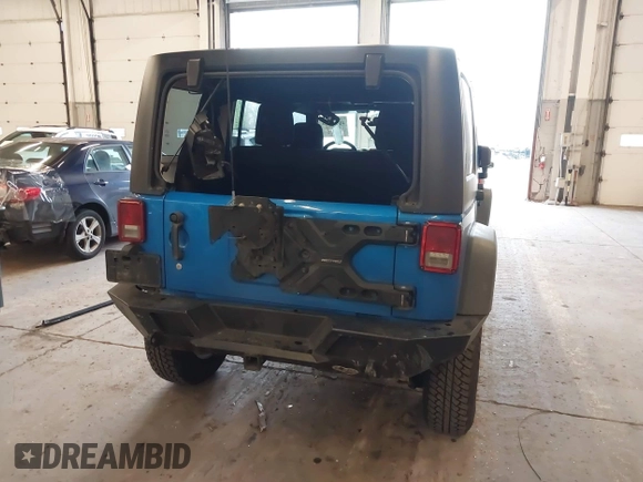 2015 Jeep Wrangler Unlimited Rubicon with VIN 1C4BJWFG7FL661643, listed as a IAAI auction lot 41291385 with 112,785 mi miles. Bid and sale history available at carsss.com. Image 17.