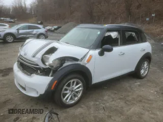 2016 MINI Countryman with VIN WMWZB3C56GWR48868, listed as a Copart auction lot 49732985 with 41,880 mi miles and Salvage title. Bid and sale history available at DreamBid. Image 1.