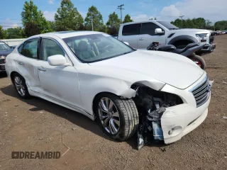 2013 Infiniti M with VIN JN1BY1AR5DM602690, listed as a Copart auction lot 64944925 with 186,302 mi miles and Salvage title. Bid and sale history available at DreamBid. Image 4.