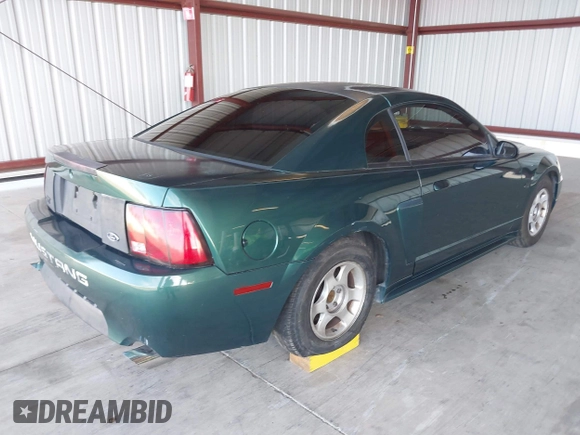 2002 Ford Mustang GT Deluxe with VIN 1FAFP42X12F190923, listed as a IAAI auction lot 41712658 with 154,816 mi miles. Bid and sale history available at carsss.com. Image 4.