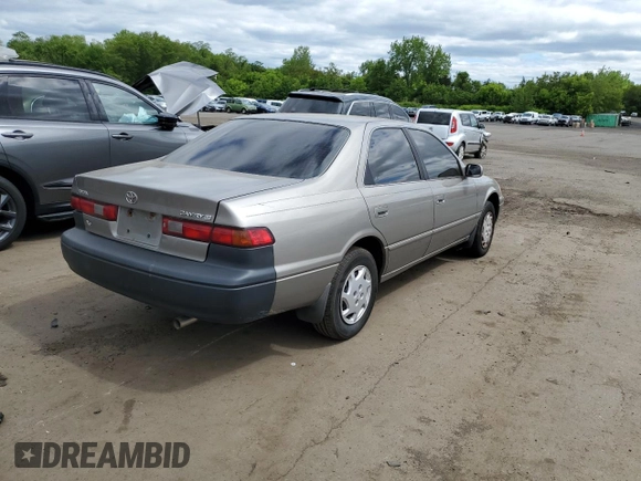 1999 Toyota Camry LE с VIN 4T1BG22K6XU404532, выставлен на аукционе Copart как лот 57449655 с пробегом 173 587 миль миль и Списание • Salvage title. История ставок и продаж доступна на DreamBid. Изображение 3.