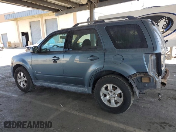 2010 Ford Escape Hybrid with VIN 1FMCU4K32AKB06645, listed as a Copart auction lot 63124055 with 162,646 mi miles and Salvage title. Bid and sale history available at DreamBid. Image 2.