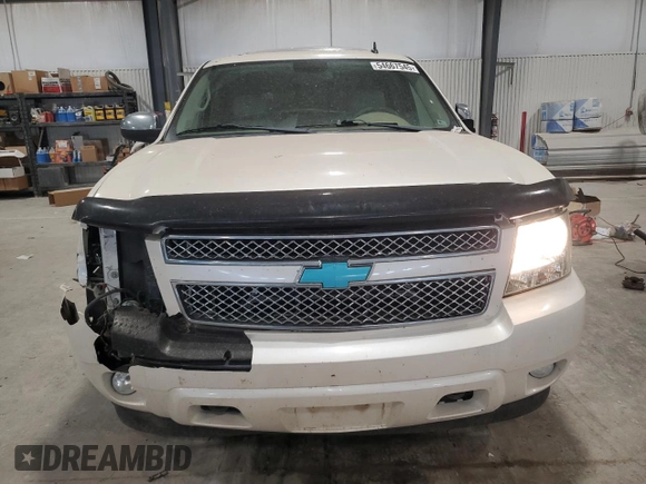 2010 Chevrolet Tahoe LTZ with VIN 1GNUKCE02AR274147, listed as a Copart auction lot 54667545 with 210,207 mi miles and Salvage title. Bid and sale history available at DreamBid. Image 5.
