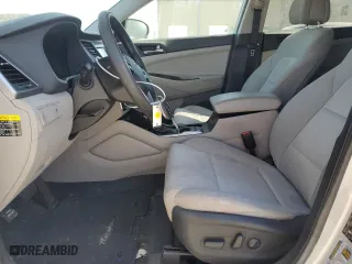 2017 Hyundai Tucson SE Plus with VIN KM8J33A40HU541676, listed as a Copart auction lot 49336575 with 129,748 mi miles and Salvage Title. Bid and sale history available at carsss.com. Image 7.