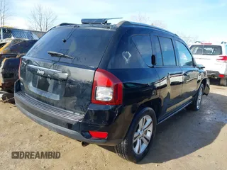 2015 Jeep Compass Sport with VIN 1C4NJDBBXFD114579, listed as a IAAI auction lot 41911501 with 95,732 mi miles and . Bid and sale history available at carsss.com. Image 4.
