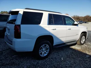 2017 Chevrolet Tahoe LS with VIN 1GNSCAKC7HR355274, listed as a Copart auction lot 85271454 with 104,897 mi miles and Salvage Title. Bid and sale history available at carsss.com. Image 3.