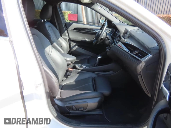 2019 BMW X2 sDrive28i with VIN WBXYJ3C57KEP77485, listed as a Copart auction lot 58860995 with 80,811 mi miles and Salvage title. Bid and sale history available at DreamBid. Image 5.