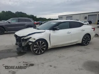 2016 Nissan Maxima SR with VIN 1N4AA6AP5GC412820, listed as a Copart auction lot 56097265 with 193,060 mi miles and Salvage title. Bid and sale history available at DreamBid. Image 1.