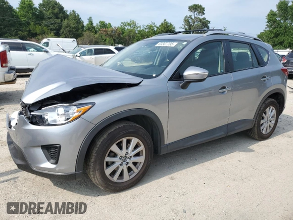 2015 Mazda CX-5 Sport with VIN JM3KE2BE4F0533273, listed as a Copart auction lot 60307795 with 120,484 mi miles and Salvage title. Bid and sale history available at DreamBid. Image 1.