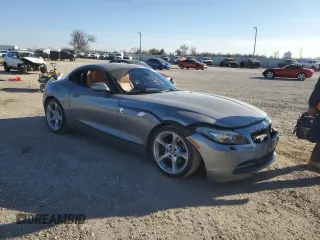 2011 BMW Z4 sDrive30i with VIN WBALM5C53BE380525, listed as a Copart auction lot 42004835 with 103,573 mi miles and Salvage Title. Bid and sale history available at carsss.com. Image 4.
