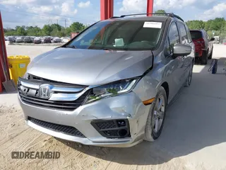 2020 Honda Odyssey EX-L with VIN 5FNRL6H72LB055672, listed as a IAAI auction lot 41586663 with 47,037 mi miles and . Bid and sale history available at carsss.com. Image 2.
