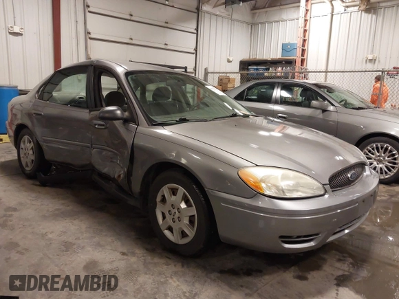 2006 Ford Taurus SE with VIN 1FAFP53U86A113947, listed as a IAAI auction lot 41753927 with 203,867 mi miles. Bid and sale history available at carsss.com. Image 1.