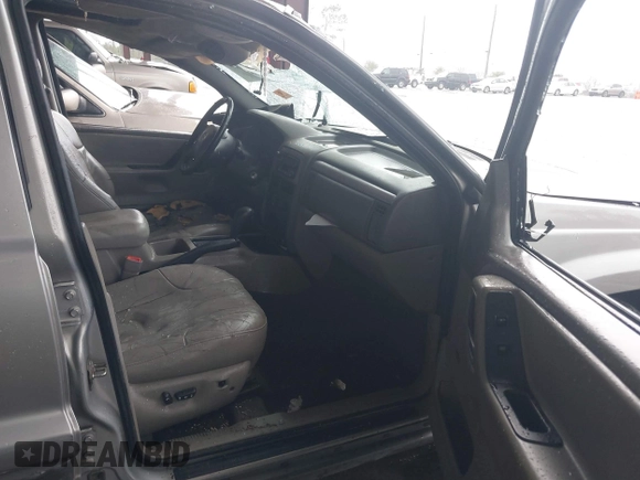 2001 Jeep Grand Cherokee Laredo with VIN 1J4GX48S51C708990, listed as a IAAI auction lot 41656323 with 198,124 mi miles and . Bid and sale history available at DreamBid. Image 5.