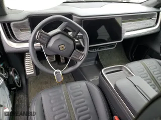 2022 Rivian R1S Launch Edition with VIN 7PDSGABL7NN001893, listed as a Copart auction lot 58809684 with 19,067 mi miles and Salvage Title. Bid and sale history available at carsss.com. Image 8.