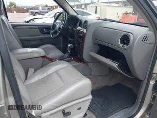 2006 GMC Envoy SLE z VIN 1GKDT13S662317827, wystawiony jako IAAI lot #42403954 z przebiegiem 132 761 mil mil oraz . Historia ofert i sprzedaży dostępna na DreamBid. Obrazek 5.