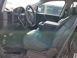 2010 Nissan Titan XE with VIN 1N6BA0EJ5AN318639, listed as a Copart auction lot 69776984 with 158,913 mi miles and Salvage Title. Bid and sale history available at carsss.com. Image 7.