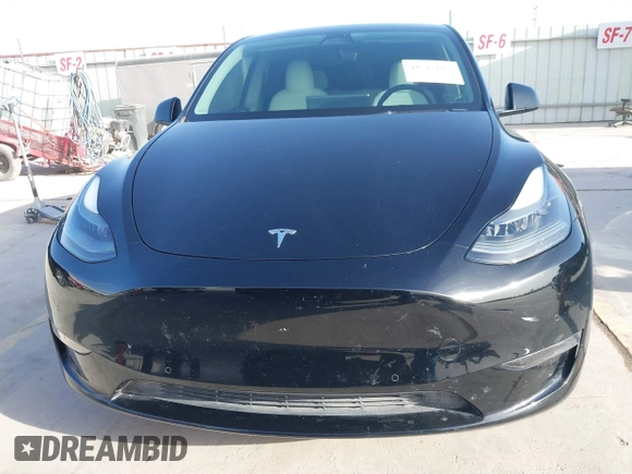 2022 Tesla Model Y Performance with VIN 7SAYGDEF6NF532027, listed as a IAAI auction lot 41717662 with 36,537 mi miles and . Bid and sale history available at DreamBid. Image 13.