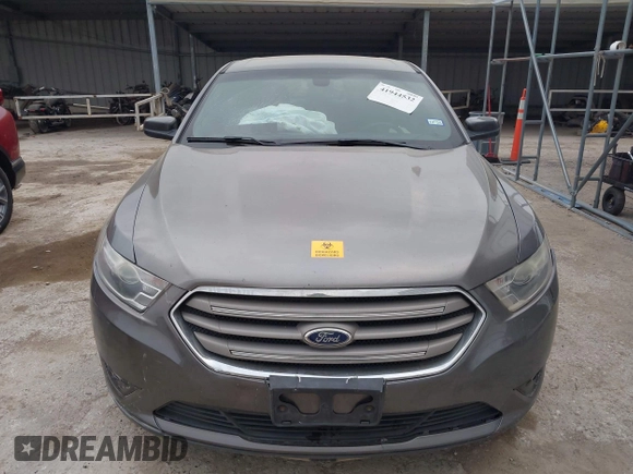 2015 Ford Taurus SEL z VIN 1FAHP2E85FG209085, wystawiony jako IAAI lot #41944532 z przebiegiem 143 850 mil mil oraz . Historia ofert i sprzedaży dostępna na DreamBid. Obrazek 12.