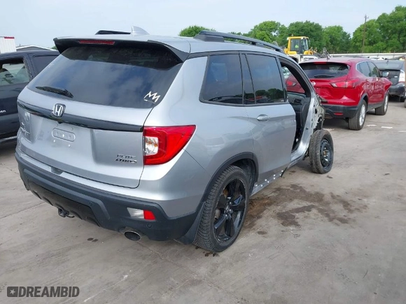 2019 Honda Passport Elite with VIN 5FNYF8H08KB018545, listed as a IAAI auction lot 41923505 with 31,249 mi miles. Bid and sale history available at carsss.com. Image 4.