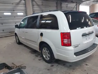 2010 Chrysler Town & Country Touring with VIN 2A4RR5D10AR369617, listed as a IAAI auction lot 42158748 with 174,437 mi miles and . Bid and sale history available at DreamBid. Image 3.