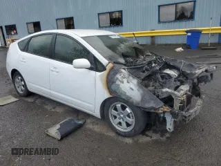 2004 Toyota Prius with VIN JTDKB22U040045296, listed as a Copart auction lot 52336425 with Not Provided miles and Non Repairable. Bid and sale history available at DreamBid. Image 4.