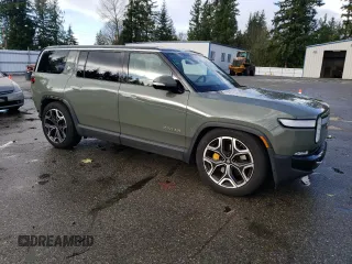 2022 Rivian R1S Launch Edition with VIN 7PDSGABL5NN001035, listed as a Copart auction lot 77188564 with Not Provided miles and Salvage Title. Bid and sale history available at carsss.com. Image 4.
