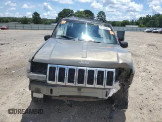 1997 Jeep Grand Cherokee Laredo with VIN 1J4GZ58S7VC505069, listed as a Copart auction lot 63255945 with 127,552 mi miles and Salvage title. Bid and sale history available at DreamBid. Image 5.