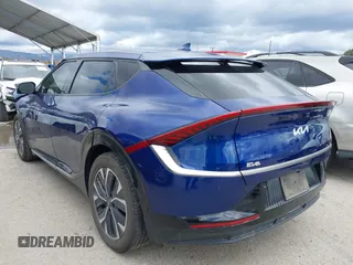 2022 Kia EV6 Wind with VIN KNDC34LA2N5049730, listed as a IAAI auction lot 41793235 with 109,806 mi miles and . Bid and sale history available at DreamBid. Image 3.