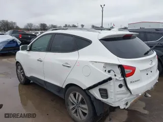 2014 Hyundai Tucson Limited with VIN KM8JU3AG5EU819667, listed as a IAAI auction lot 41565202 with 58,600 mi miles. Bid and sale history available at carsss.com. Image 3.