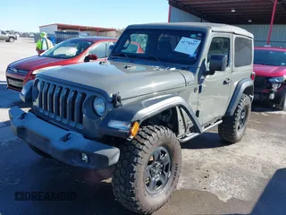 2018 Jeep Wrangler Sport S with VIN 1C4GJXAG4JW283209, listed as a IAAI auction lot 41770557 with 34,041 mi miles and . Bid and sale history available at DreamBid. Image 2.