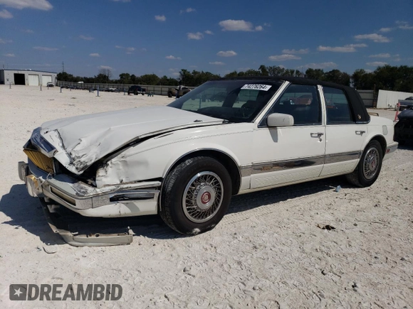 1991 Cadillac Seville z VIN 1G6KS53B9MU824142, wystawiony jako Copart lot #74276264 z przebiegiem 103 517 mil mil oraz Szkody całkowita. Historia ofert i sprzedaży dostępna na DreamBid. Obrazek 1.