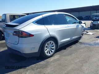 2016 Tesla Model X 70D with VIN 5YJXCAE21GF033123, listed as a IAAI auction lot 39813497 with 162,509 mi miles and . Bid and sale history available at DreamBid. Image 4.