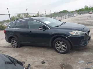 2014 Mazda CX-9 Sport with VIN JM3TB3BV8E0437180, listed as a IAAI auction lot 42413844 with 177,393 mi miles and . Bid and sale history available at DreamBid. Image 13.