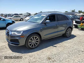 2018 Audi Q3 Premium with VIN WA1BCCFS0JR032934, listed as a Copart auction lot 64037605 with 21,133 mi miles and Salvage title. Bid and sale history available at DreamBid. Image 1.