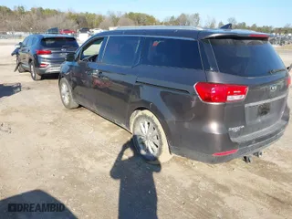 2016 Kia Sedona EX with VIN KNDMC5C14G6108235, listed as a IAAI auction lot 41497169 with 105,218 mi miles. Bid and sale history available at carsss.com. Image 3.