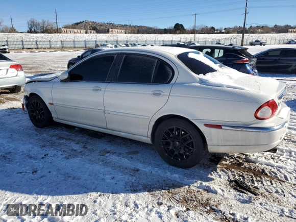 2005 Jaguar X-Type z VIN SAJWB52D95XE21462, wystawiony jako Copart lot #89216475 z przebiegiem 114 257 mil mil oraz Szkoda całkowita • Salvage title. Historia ofert i sprzedaży dostępna na DreamBid. Obrazek 2.
