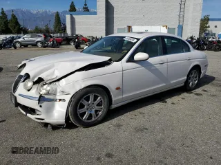 2004 Jaguar S-Type with VIN SAJEA01T34FN01609, listed as a Copart auction lot 45596495 with 212,028 mi miles and Salvage Title. Bid and sale history available at DreamBid. Image 1.