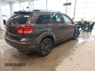 2018 Dodge Journey SE with VIN 3C4PDCAB9JT428917, listed as a IAAI auction lot 41578750 with 136,886 mi miles and . Bid and sale history available at DreamBid. Image 4.