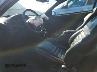 2000 Ford Mustang GT с VIN 1FAFP45X9YF250922, выставлен на аукционе Copart как лот 86163294 с пробегом 78 744 миль миль и Списание • Salvage title. История ставок и продаж доступна на DreamBid. Изображение 7.