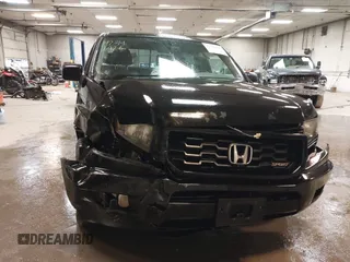 2013 Honda Ridgeline Sport with VIN 5FPYK1F77DB001247, listed as a IAAI auction lot 42346926 with 187,565 mi miles and . Bid and sale history available at DreamBid. Image 6.