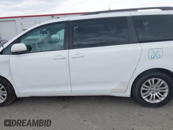 2011 Toyota Sienna XLE AAS with VIN 5TDYK3DC3BS161414, listed as a IAAI auction lot 41124705 with 167,364 mi miles. Bid and sale history available at carsss.com. Image 14.