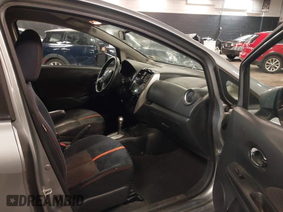 2015 Nissan Note SV with VIN 3N1CE2CP0FL400447, listed as a IAAI auction lot 41669498 with 96,699 mi miles and . Bid and sale history available at DreamBid. Image 5.