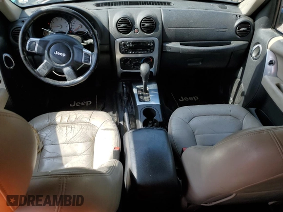 2004 Jeep Liberty Limited z VIN 1J4GL58K34W122843, wystawiony jako Copart lot #54686795 z przebiegiem 240 821 mil mil oraz Szkoda całkowita • Salvage title. Historia ofert i sprzedaży dostępna na DreamBid. Obrazek 8.