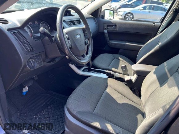 2008 Ford Focus SE with VIN 1FAHP35N28W24058, listed as a Copart auction lot 66020775 with 164,683 mi miles and Clean title. Bid and sale history available at DreamBid. Image 7.
