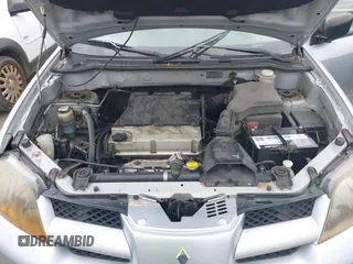 2004 Mitsubishi Outlander LS with VIN JA4LX31F04U038009, listed as a IAAI auction lot 41616254 with 219,527 mi miles. Bid and sale history available at carsss.com. Image 10.