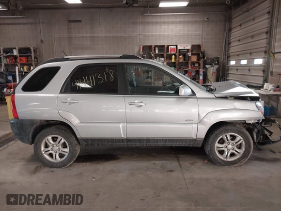 2005 Kia Sportage LX with VIN KNDJE723X57071792, listed as a IAAI auction lot 41441318 with 249,652 mi miles and . Bid and sale history available at carsss.com. Image 14.
