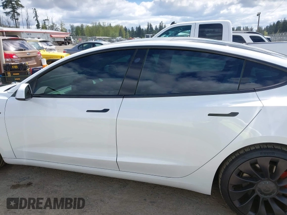 2021 Tesla Model 3 Performance with VIN 5YJ3E1EC2MF096681, listed as a IAAI auction lot 42068782 with 34,852 mi miles and . Bid and sale history available at DreamBid. Image 15.
