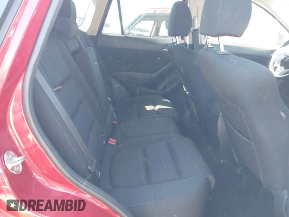 2016 Mazda CX-5 Touring with VIN JM3KE4CY0G0890309, listed as a IAAI auction lot 41890840 with 89,023 mi miles and . Bid and sale history available at carsss.com. Image 8.